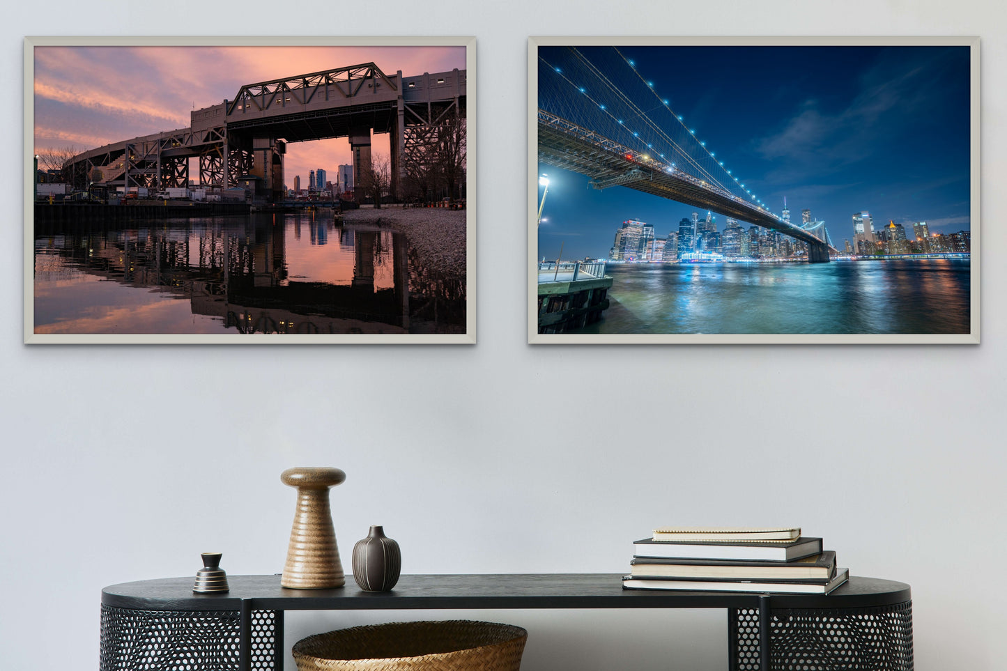 Two framed prints hang above a metal desk, a sunset shot of the Smith & 9th subway station in Gowanus Brooklyn and a blue evening shot of the Brooklyn Bridge.